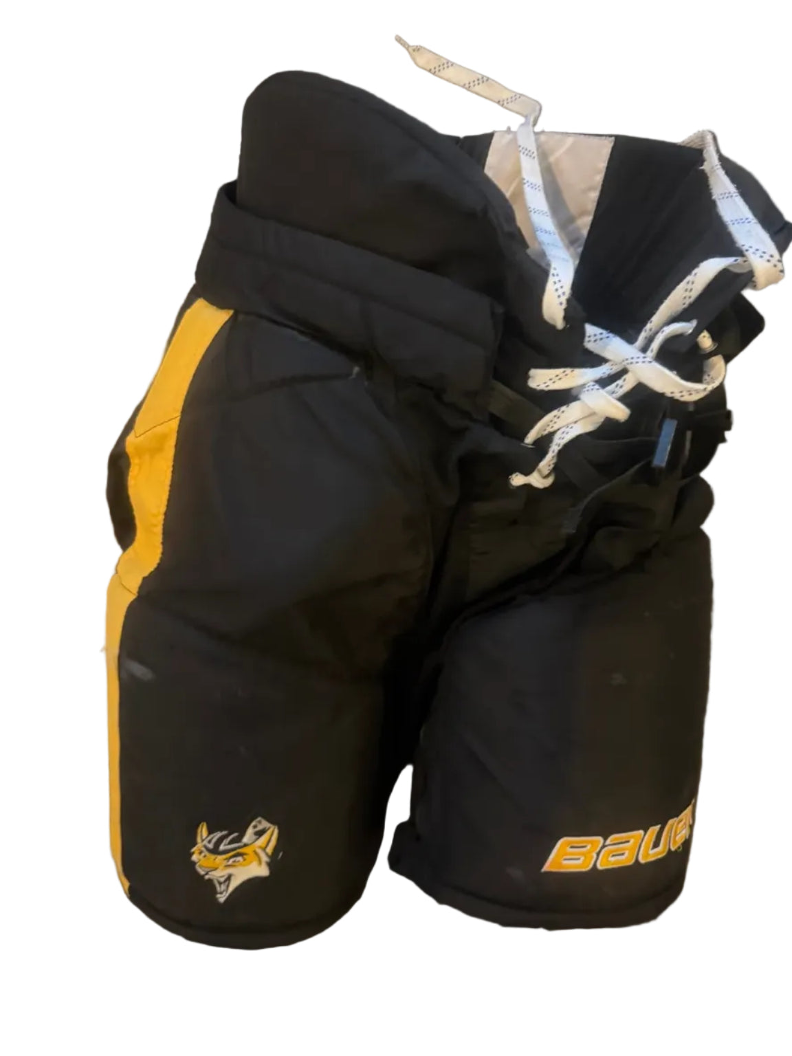 A pair of black hockey goalie pads with yellow stripes and a yellow mascot logo, shown on a dark gray surface. One pad displays the 'Bauer' brand name in yellow, and the other shows a yellow and black mascot logo.